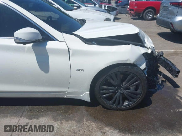 2019 Infiniti Q50 Luxe z VIN JN1EV7AP7KM513482, wystawiony jako IAAI lot #42000334 z przebiegiem 101 789 mil mil oraz . Historia ofert i sprzedaży dostępna na DreamBid. Obrazek 18.