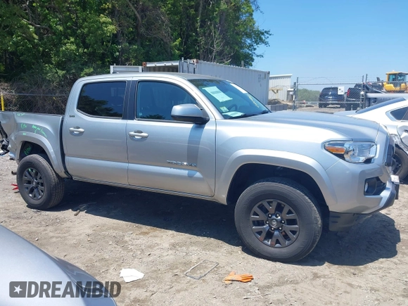 2023 Toyota Tacoma SR with VIN 3TYCZ5AN2PT141576, listed as a IAAI auction lot 42492127 with 43,431 mi miles and . Bid and sale history available at DreamBid. Image 14.