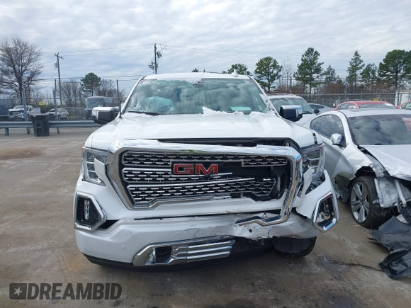 2020 GMC Sierra 1500 Denali z VIN 3GTU9FELXLG371258, wystawiony jako IAAI lot #41303490 z przebiegiem 63 571 mil mil oraz . Historia ofert i sprzedaży dostępna na DreamBid. Obrazek 12.