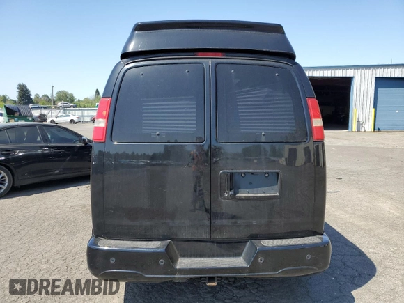 2018 Chevrolet Express Cargo Van with VIN 1GCWGBFG5J1242705, listed as a Copart auction lot 55627615 with 77,611 mi miles and Clean Title. Bid and sale history available at carsss.com. Image 6.