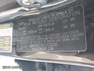 2007 Kia Rondo LX with VIN KNAFG525877029532, listed as a IAAI auction lot 42036604 with 225,698 mi miles. Bid and sale history available at carsss.com. Image 9.