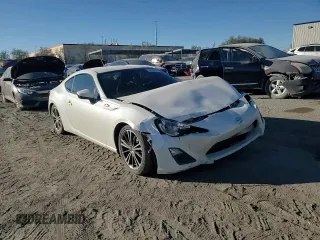 2013 Scion FR-S z VIN JF1ZNAA1XD1731496, wystawiony jako Copart lot #88248615 z przebiegiem 150 921 mil mil oraz Szkoda całkowita • Salvage title. Historia ofert i sprzedaży dostępna na DreamBid. Obrazek 10.