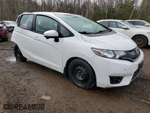 2015 Honda Fit EX-L z VIN 3HGGK5H84FM107978, wystawiony jako Copart lot #54879335 z przebiegiem 193 583 mil mil oraz Nie do naprawy • Non repairable. Historia ofert i sprzedaży dostępna na DreamBid. Obrazek 4.
