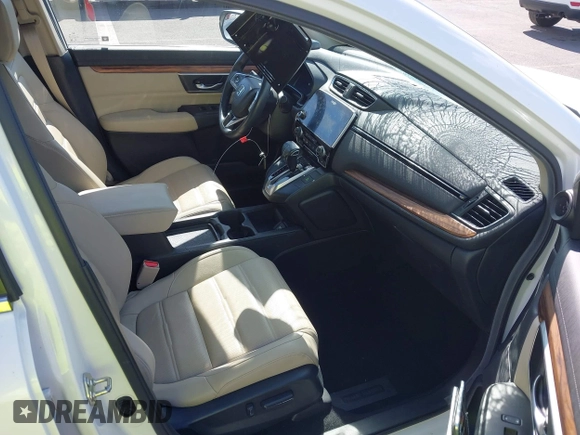 2018 Honda CR-V Touring with VIN 2HKRW1H96JH506435, listed as a IAAI auction lot 41228873 with 11,585 mi miles and . Bid and sale history available at DreamBid. Image 5.