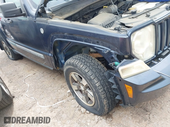 2008 Jeep Liberty Sport with VIN 1J8GN28K28W261858, listed as a IAAI auction lot 42122117 with 97,865 mi miles. Bid and sale history available at carsss.com. Image 6.