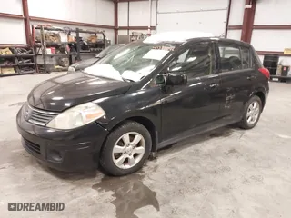 2009 Nissan Versa 1.8 S with VIN 3N1BC13E99L393142, listed as a IAAI auction lot 41377246 with 115,591 mi miles. Bid and sale history available at carsss.com. Image 2.