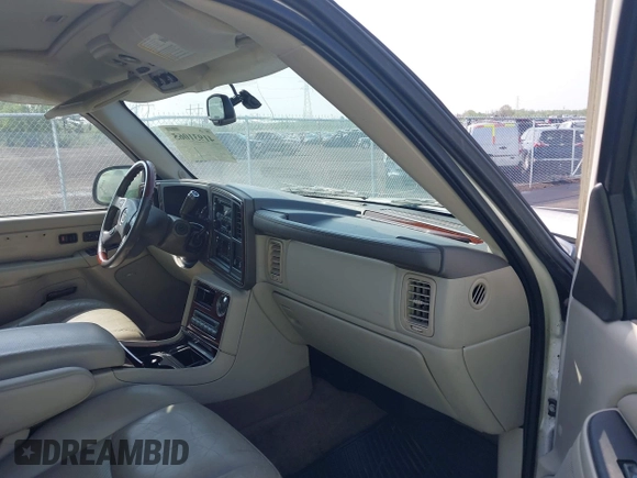 2005 Cadillac Escalade z VIN 1GYEC63T55R114823, wystawiony jako IAAI lot #41931065 z przebiegiem Nie podano mil oraz . Historia ofert i sprzedaży dostępna na DreamBid. Obrazek 5.