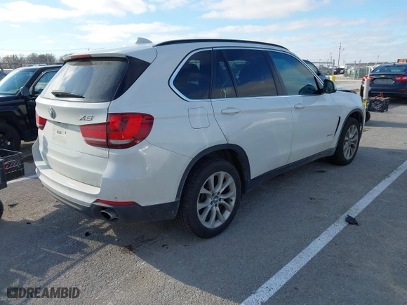 2016 BMW X5 xDrive35i with VIN 5UXKR0C52G0P29633, listed as a IAAI auction lot 41057391 with 176,697 mi miles. Bid and sale history available at carsss.com. Image 4.