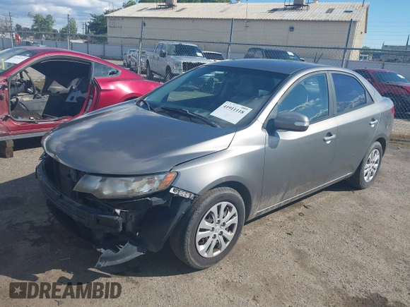 2010 Kia Forte EX with VIN KNAFU4A28A5229372, listed as a IAAI auction lot 41911118 with 166,084 mi miles. Bid and sale history available at carsss.com. Image 2.