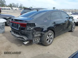 2019 Kia Forte LXS with VIN 3KPF24AD0KE109792, listed as a IAAI auction lot 42242300 with 57,680 mi miles and . Bid and sale history available at DreamBid. Image 4.