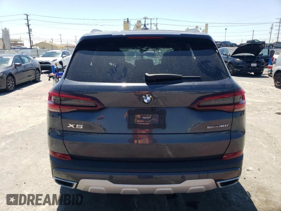 2021 BMW X5 sDrive40i z VIN 5UXCR4C02M9G93906, wystawiony jako Copart lot #63986844 z przebiegiem 32 411 mil mil oraz Szkoda całkowita • Salvage title. Historia ofert i sprzedaży dostępna na DreamBid. Obrazek 6.