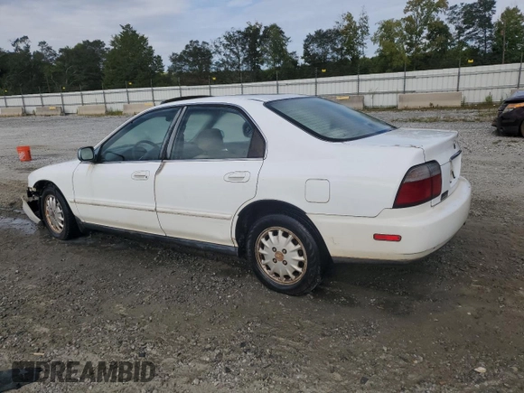 1996 Honda Accord EX with VIN 1HGCD5657TA001356, listed as a Copart auction lot 69712964 with 241,689 mi miles and Salvage Title. Bid and sale history available at DreamBid. Image 2.