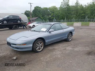 1995 Ford Probe z VIN 1ZVLT20A6S5154983, wystawiony jako IAAI lot #42301574 z przebiegiem 128 515 mil mil oraz . Historia ofert i sprzedaży dostępna na DreamBid. Obrazek 2.