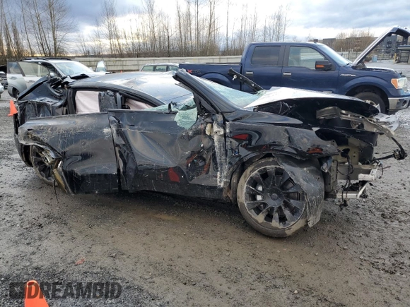 2023 Tesla Model Y Long Range with VIN 7SAYGAEE0PF832185, listed as a Copart auction lot 85159764 with Not Provided miles and Salvage Title. Bid and sale history available at DreamBid. Image 4.
