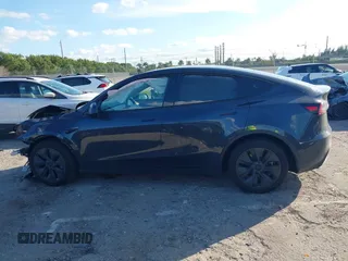 2025 Tesla Model Y Long Range with VIN 7SAYGDED4SF226776, listed as a IAAI auction lot 41514317 with 1,636 mi miles and . Bid and sale history available at DreamBid. Image 15.