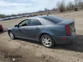 2007 Cadillac STS z VIN 1G6DW677970160672, wystawiony jako Copart lot #50568525 z przebiegiem 127 699 mil mil oraz Szkody całkowita. Historia ofert i sprzedaży dostępna na DreamBid. Obrazek 2.