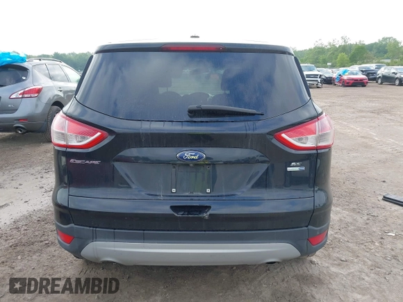 2014 Ford Escape SE z VIN 1FMCU9G9XEUA15367, wystawiony jako IAAI lot #42358528 z przebiegiem 145 994 mil mil oraz . Historia ofert i sprzedaży dostępna na DreamBid. Obrazek 16.