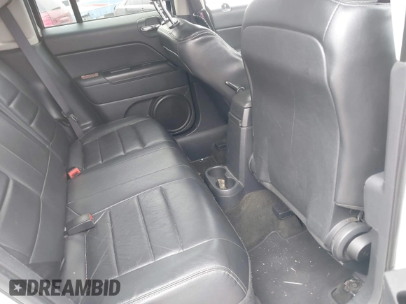 2016 Jeep Patriot High Altitude Edition with VIN 1C4NJRFB3GD753248, listed as a IAAI auction lot 42005423 with 165,229 mi miles. Bid and sale history available at carsss.com. Image 8.