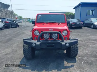 2014 Jeep Wrangler Unlimited Rubicon with VIN 1C4BJWFG0EL326979, listed as a IAAI auction lot 41913129 with 118,548 mi miles and . Bid and sale history available at DreamBid. Image 13.