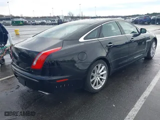 2011 Jaguar XJ with VIN SAJWA1CB8BLV12389, listed as a IAAI auction lot 41957217 with 51,585 mi miles. Bid and sale history available at carsss.com. Image 4.