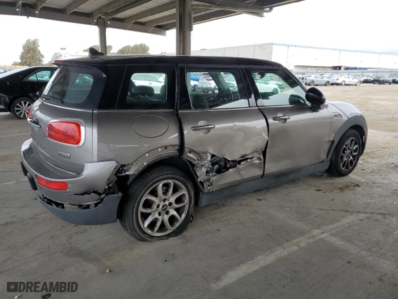 2017 MINI Clubman Cooper with VIN WMWLN5C50H2E32560, listed as a Copart auction lot 47664365 with 75,182 mi miles and Salvage Title. Bid and sale history available at carsss.com. Image 3.