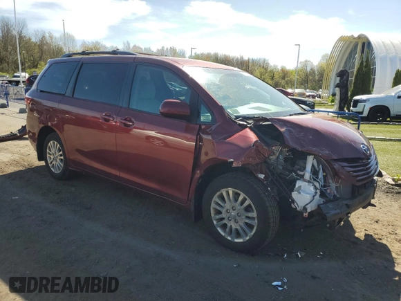 2016 Toyota Sienna LE with VIN 5TDJK3DC5GS132571, listed as a Copart auction lot 55155505 with 143,294 mi miles and Salvage Title. Bid and sale history available at carsss.com. Image 4.