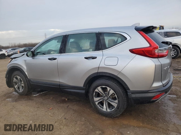 2019 Honda CR-V LX with VIN 2HKRW6H32KH229616, listed as a Copart auction lot 87234024 with 21,980 mi miles and Salvage Title. Bid and sale history available at DreamBid. Image 2.