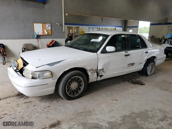 2003 Ford Crown Victoria LX with VIN 2FAFP74W23X134274, listed as a Copart auction lot 73295754 with 212,581 mi miles and Salvage Title. Bid and sale history available at carsss.com. Image 1.
