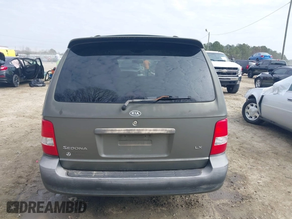 2004 Kia Sedona LX with VIN KNDUP131546543841, listed as a IAAI auction lot 41541012 with 112,122 mi miles. Bid and sale history available at carsss.com. Image 16.