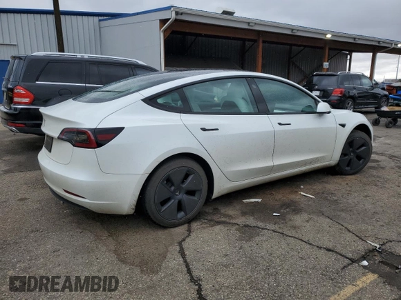 2023 Tesla Model 3 with VIN 5YJ3E1EAXPF600008, listed as a Copart auction lot 51868055 with 58,733 mi miles and Salvage title. Bid and sale history available at DreamBid. Image 3.