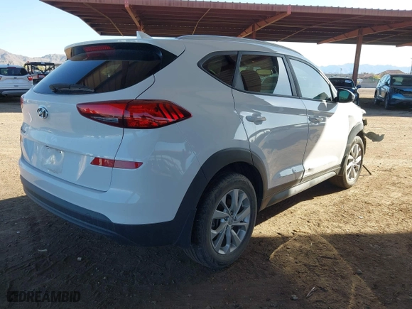 2019 Hyundai Tucson Value with VIN KM8J33A49KU979927, listed as a IAAI auction lot 41818355 with 96,208 mi miles. Bid and sale history available at carsss.com. Image 4.