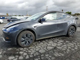 2024 Tesla Model Y Long Range with VIN 7SAYGAEE1RF107617, listed as a Copart auction lot 48224405 with 10,637 mi miles and Salvage title. Bid and sale history available at DreamBid. Image 1.