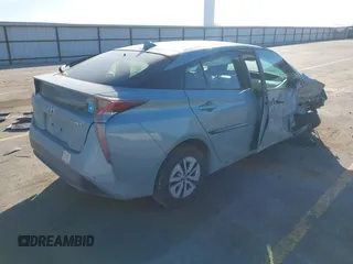 2018 Toyota Prius Two with VIN JTDKARFU1J3057604, listed as a IAAI auction lot 41446327 with 72,023 mi miles. Bid and sale history available at carsss.com. Image 4.