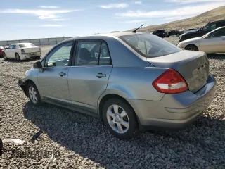 2007 Nissan Versa 1.8 S with VIN 3N1BC11E17L446450, listed as a Copart auction lot 52631415 with 121,006 mi miles and Salvage Title. Bid and sale history available at carsss.com. Image 2.