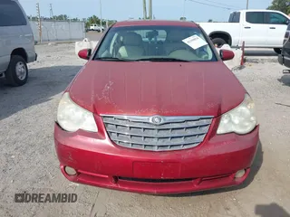 2007 Chrysler Sebring Limited z VIN 1C3LC66K27N529614, wystawiony jako IAAI lot #42198818 z przebiegiem 256 298 mil mil oraz . Historia ofert i sprzedaży dostępna na DreamBid. Obrazek 12.