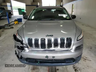 2017 Jeep Cherokee Altitude with VIN 1C4PJLABXHW586048, listed as a Copart auction lot 62674745 with 106,334 mi miles and Salvage title. Bid and sale history available at DreamBid. Image 5.