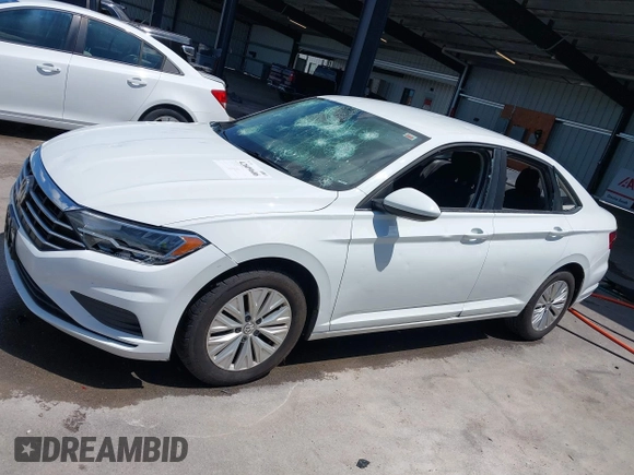 2019 Volkswagen Jetta S z VIN 3VWC57BU7KM200586, wystawiony jako IAAI lot #42609606 z przebiegiem 72 874 mil mil oraz . Historia ofert i sprzedaży dostępna na DreamBid. Obrazek 14.