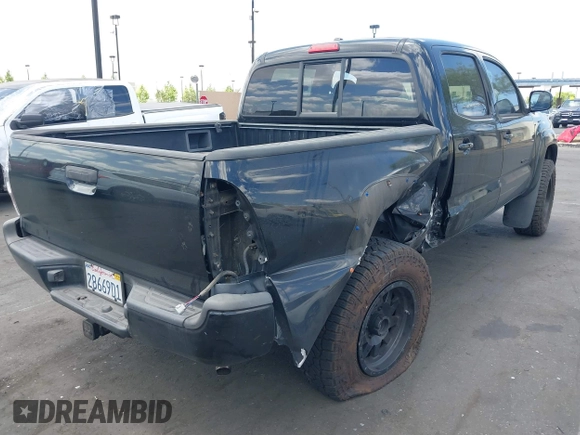 2011 Toyota Tacoma with VIN 3TMLU4EN5BM075967, listed as a IAAI auction lot 42228409 with 158,241 mi miles and . Bid and sale history available at DreamBid. Image 4.