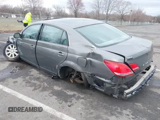 2006 Toyota Avalon XL with VIN 4T1BK36B16U111487, listed as a IAAI auction lot 41816193 with 214,557 mi miles. Bid and sale history available at carsss.com. Image 3.