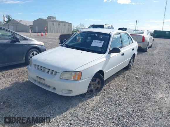 2002 Hyundai Accent GL with VIN KMHCG45C92U347708, listed as a IAAI auction lot 42137086 with 73,271 mi miles. Bid and sale history available at carsss.com. Image 2.