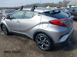 2018 Toyota C-HR XLE with VIN NMTKHMBX6JR057321, listed as a IAAI auction lot 41894322 with 50,606 mi miles. Bid and sale history available at carsss.com. Image 3.