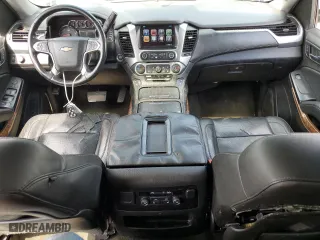 2015 Chevrolet Suburban LTZ with VIN 1GNSCKKCXFR216890, listed as a Copart auction lot 52695155 with 233,296 mi miles and Clean Title. Bid and sale history available at carsss.com. Image 8.