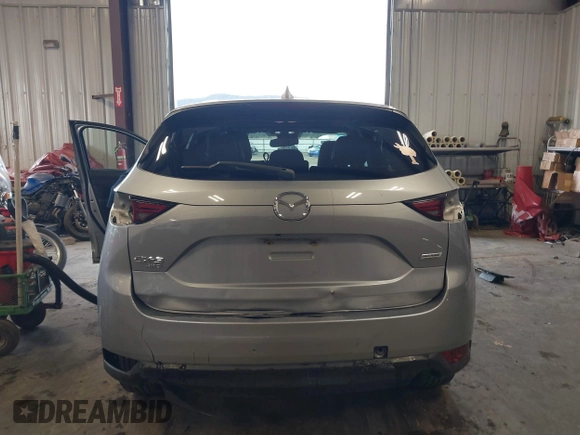 2018 Mazda CX-5 Grand Touring with VIN JM3KFBDM4J0350420, listed as a IAAI auction lot 41881566 with 96,515 mi miles. Bid and sale history available at carsss.com. Image 17.