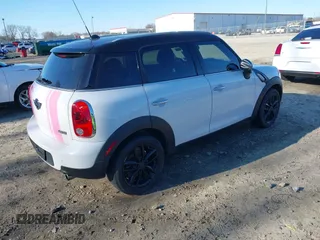 2012 MINI Countryman with VIN WMWZB3C50CWM30524, listed as a IAAI auction lot 41623400 with 194,858 mi miles and . Bid and sale history available at DreamBid. Image 4.