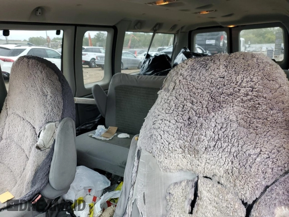 2005 Ford Econoline Passenger XL with VIN 1FBNE31L45HA98769, listed as a Copart auction lot 72427824 with 94,304 mi miles and Salvage Title. Bid and sale history available at DreamBid. Image 10.