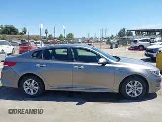 2016 Kia Optima LX with VIN 5XXGT4L36GG098804, listed as a IAAI auction lot 42772231 with 206,471 mi miles and . Bid and sale history available at DreamBid. Image 14.