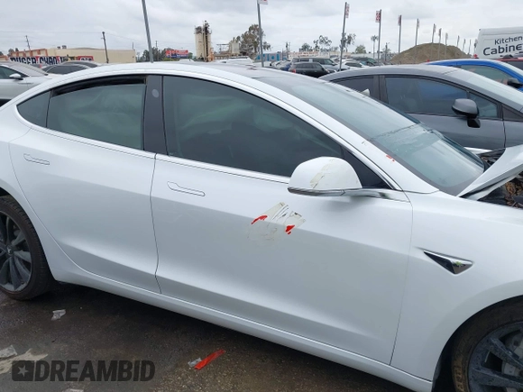 2018 Tesla Model 3 Long Range Battery with VIN 5YJ3E1EA1JF038751, listed as a IAAI auction lot 40553966 with 95,753 mi miles and . Bid and sale history available at DreamBid. Image 12.