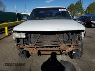 2001 Chevrolet Silverado 1500 LS with VIN 1GCEK19TX1E288438, listed as a Copart auction lot 55347945 with 215,060 mi miles and Clean Title. Bid and sale history available at DreamBid. Image 5.