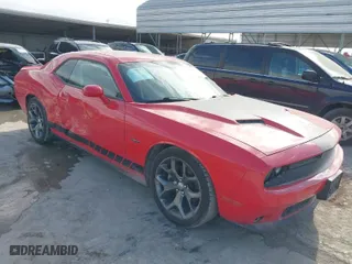 2015 Dodge Challenger R/T with VIN 2C3CDZAT2FH911390, listed as a IAAI auction lot 40882976 with 102,028 mi miles. Bid and sale history available at carsss.com. Image 1.