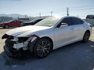 2024 Lexus ES 300h with VIN 58ADA1C1XRU054067, listed as a Copart auction lot 56559045 with 9,707 mi miles and Salvage title. Bid and sale history available at DreamBid. Image 1.